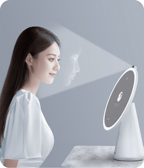 A woman using a smart mirror for face analysis.